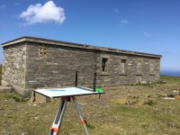 a surveying table used during the research and the one building left at the top of Costa Hill