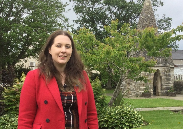 Emma Roddick standing in Tankerness House Gardens