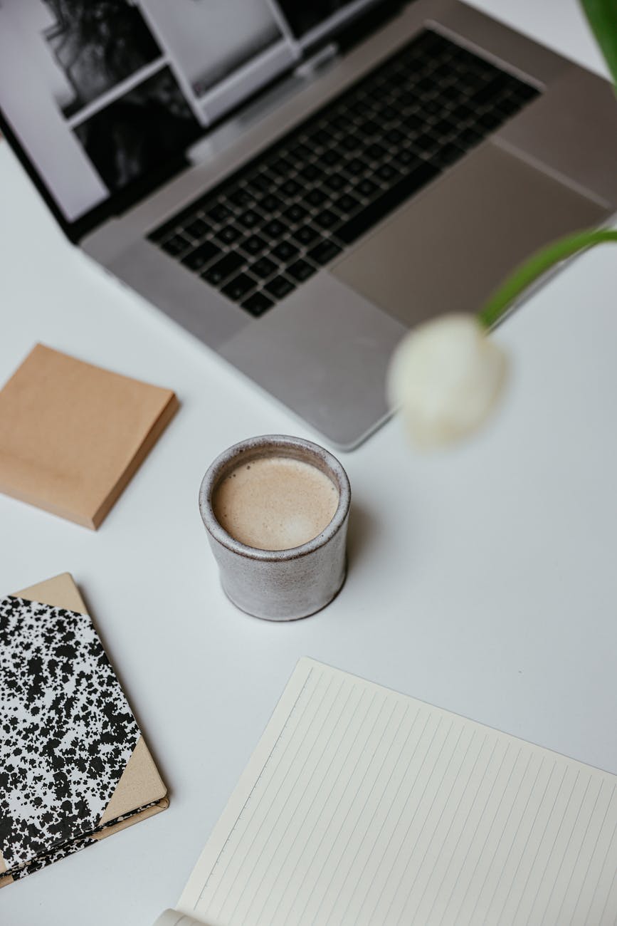 cup of coffee on white surface