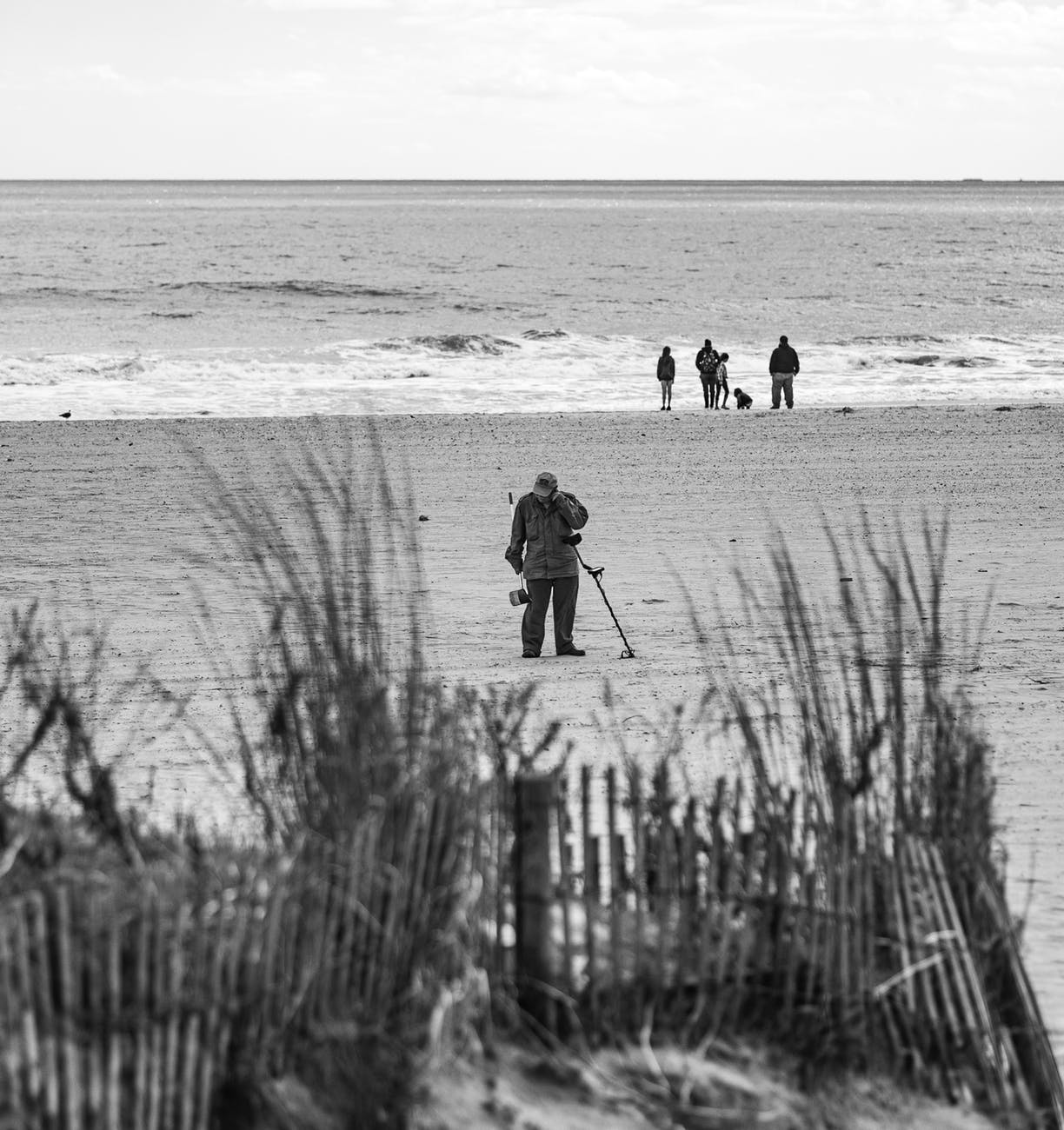 man beachcombing