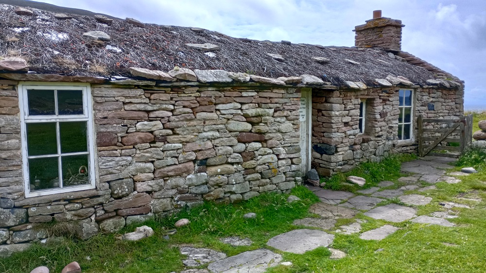 Burnmouth cottage on Hoy at Racwick owned by Hoy Decelopment Trust. A traditional cottage with tangles and stones on the roof and free to use for anyone