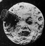 screen shot from the film where the rocket lands in the eye on the face of the moon