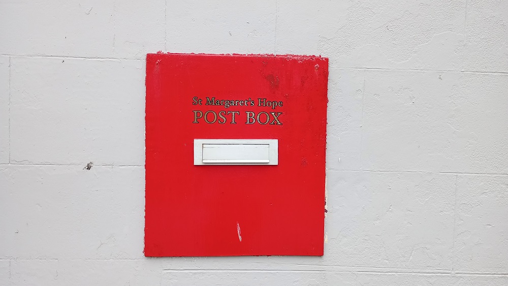 post box set within the wall at St Margaret's Hope