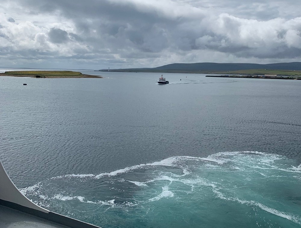 Looking from the ferry Hamnavoe across the hrabour as the small Graemsay ferry comes in