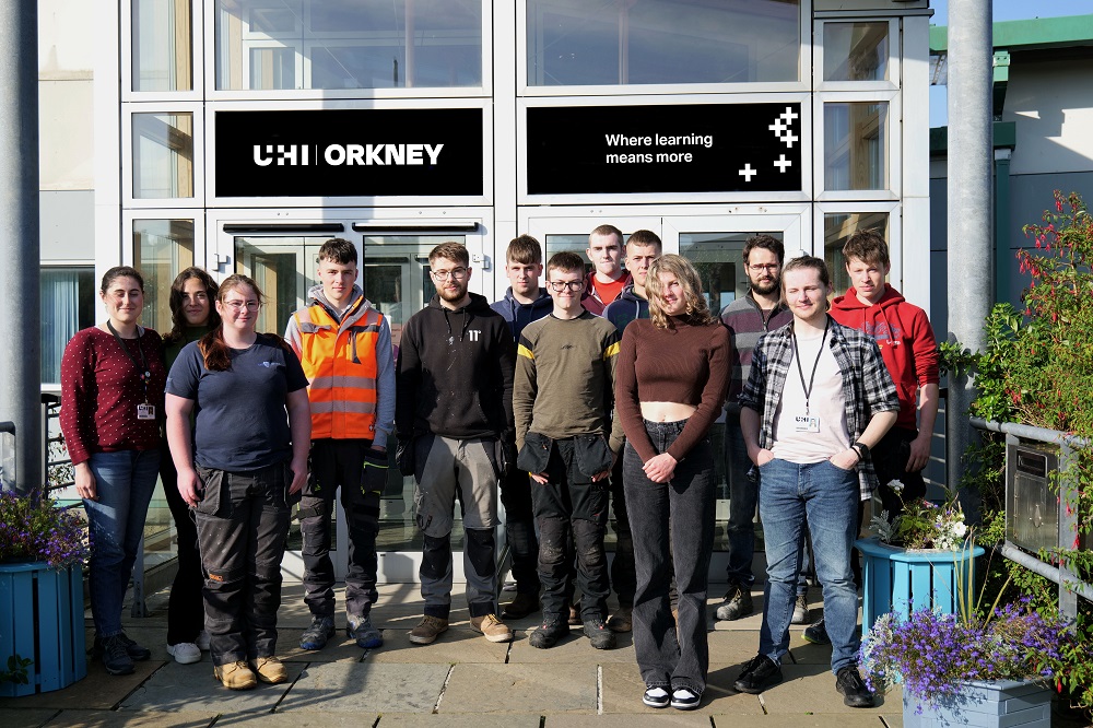 a group of young people standing outside the building which was Orkney College now with the name UHI Orkney