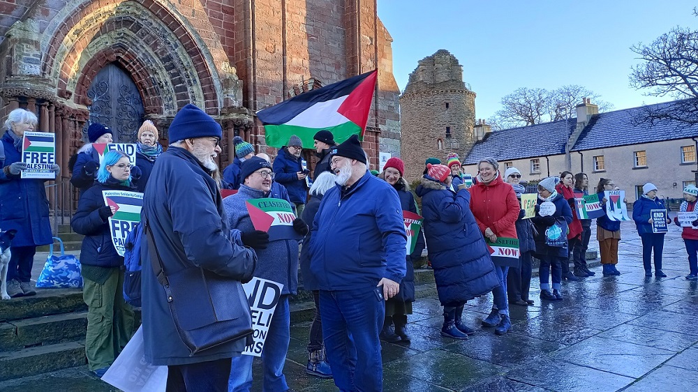a group of people at the vigil