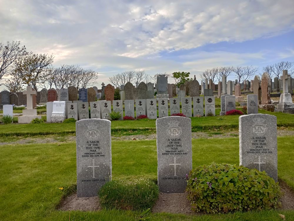 3 graves of unknown men