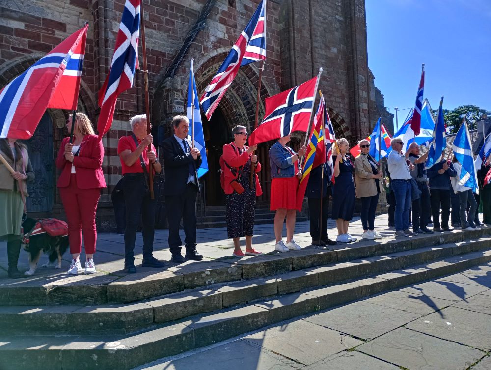 flag bearers on steps of St Magnus Cathedral