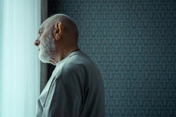 photo of an elderly man with gray facial hair
