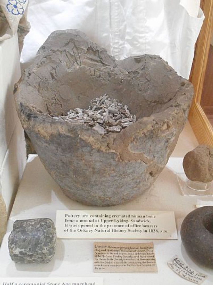 the large urn with remains in it found by Charles Clouston and on display