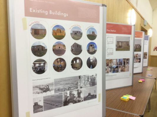 a series of the information panels starting with one of the existing buildings it is planned to develop