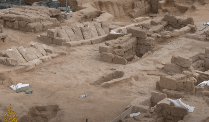 excavated graves, lined in stone, shows an extensive site