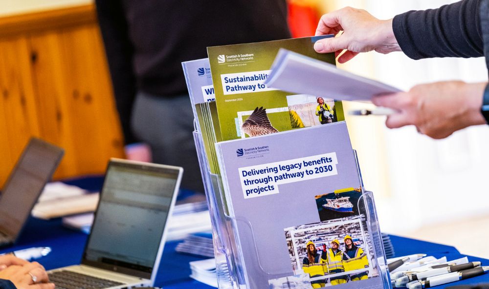 a group of information leaflets on a stand