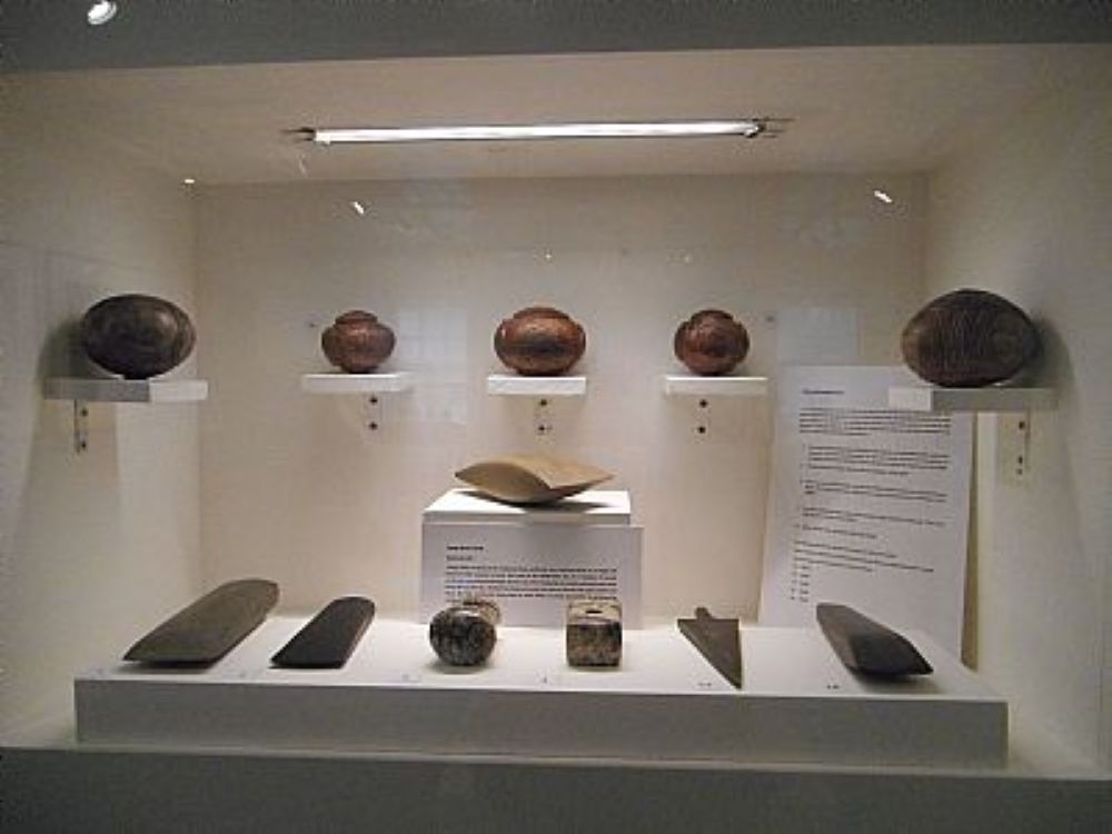 a display of objects made from clay and stone