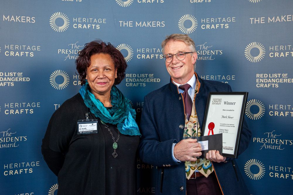 Mark Shiner being presented with the award