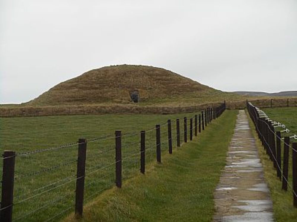 the neolithic burial mound of Maeshowe with the path leading to it
