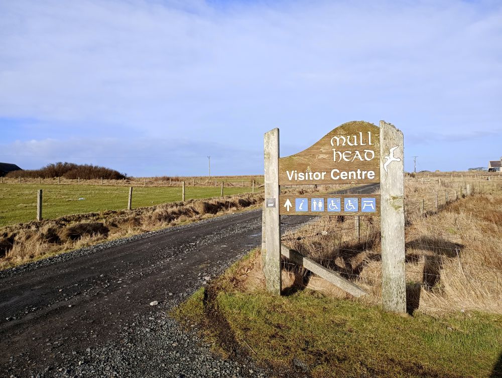 large sign for Mull Head visitor centre in Deerness